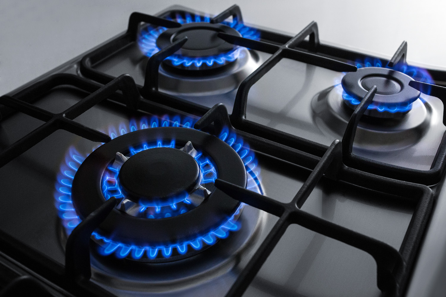 5-burner gas cooktop made in Italy in stainless steel finish with sealed burners, cast iron grates, wok stand, and stainless steel frame to allow installation in 30